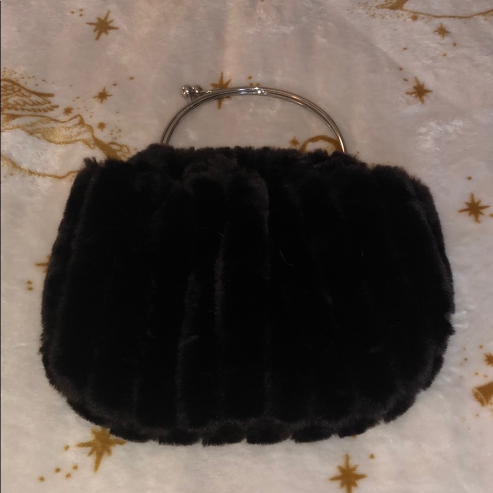 Super cute old school wrist bag!